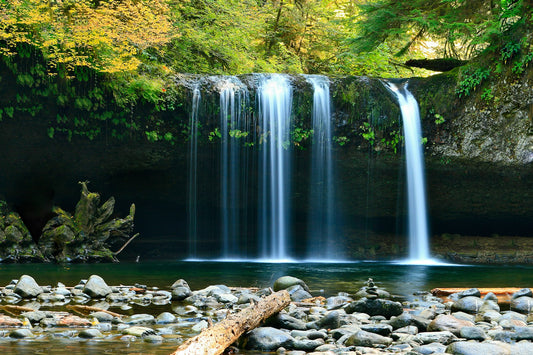 Waterfall deep in a green forest